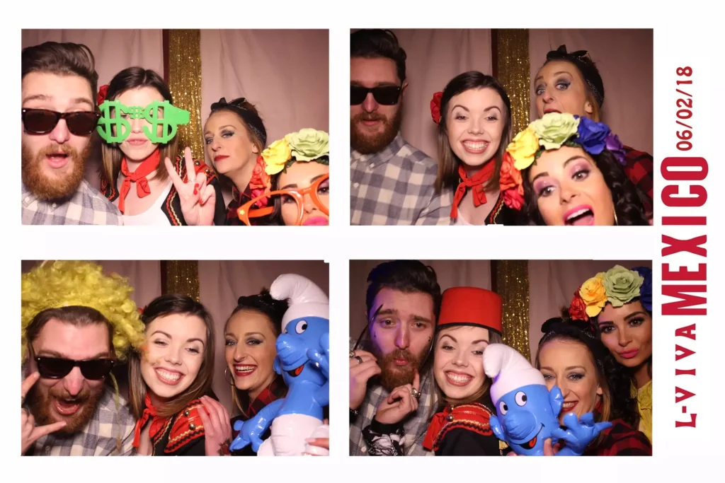 Young fellows having fun time inside the photo booth